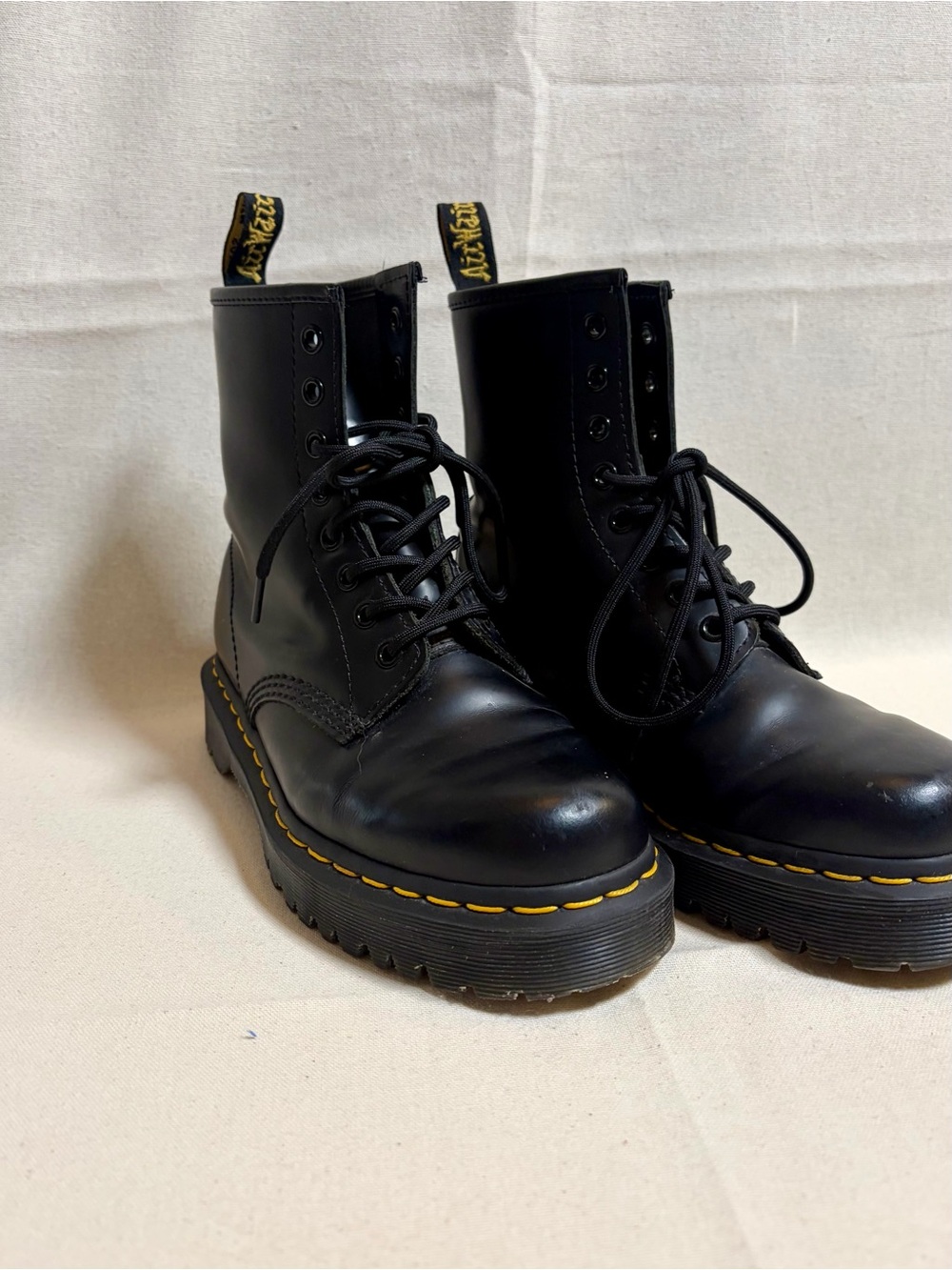 Dr. Martens Black Leather Lace-Up Platform Boots with Yellow Stitching